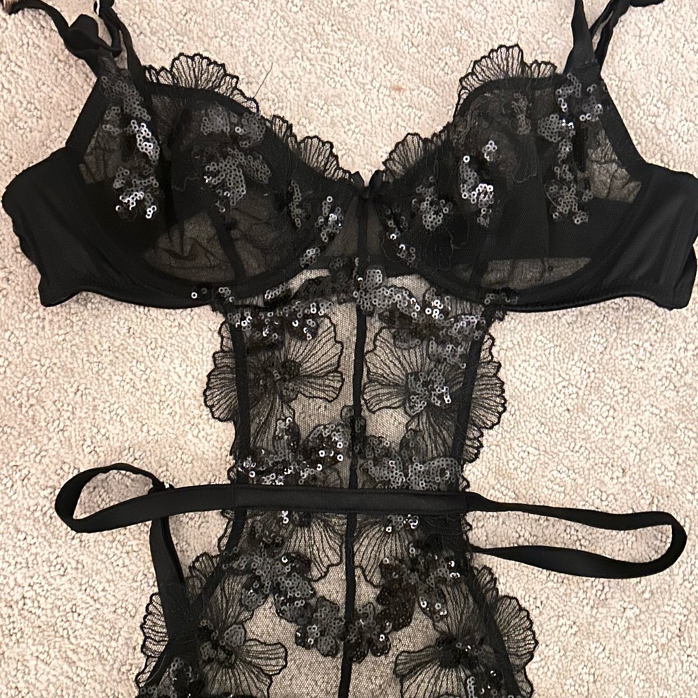 Fleur du mal one piece with collar - never been worn size M